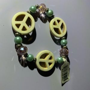 🗯5/$12 ! Yellow green Nicole peace bracelet